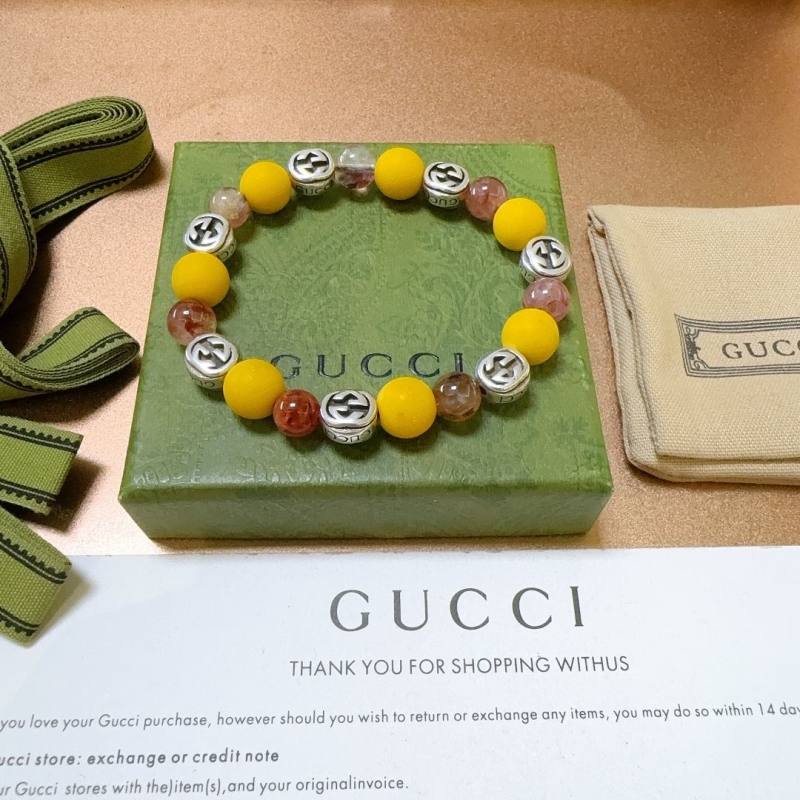 G*u*i bracelets